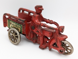 Great 1930s Hubley Cast Iron Crash Car Tricycle with Paper Label for Eade's Bakery