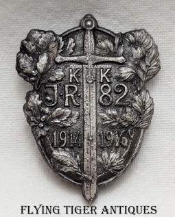 Beautiful WWI Austrian 82nd Infantry Regiment 1914-1916 Cap Badge in Silvered White Metal